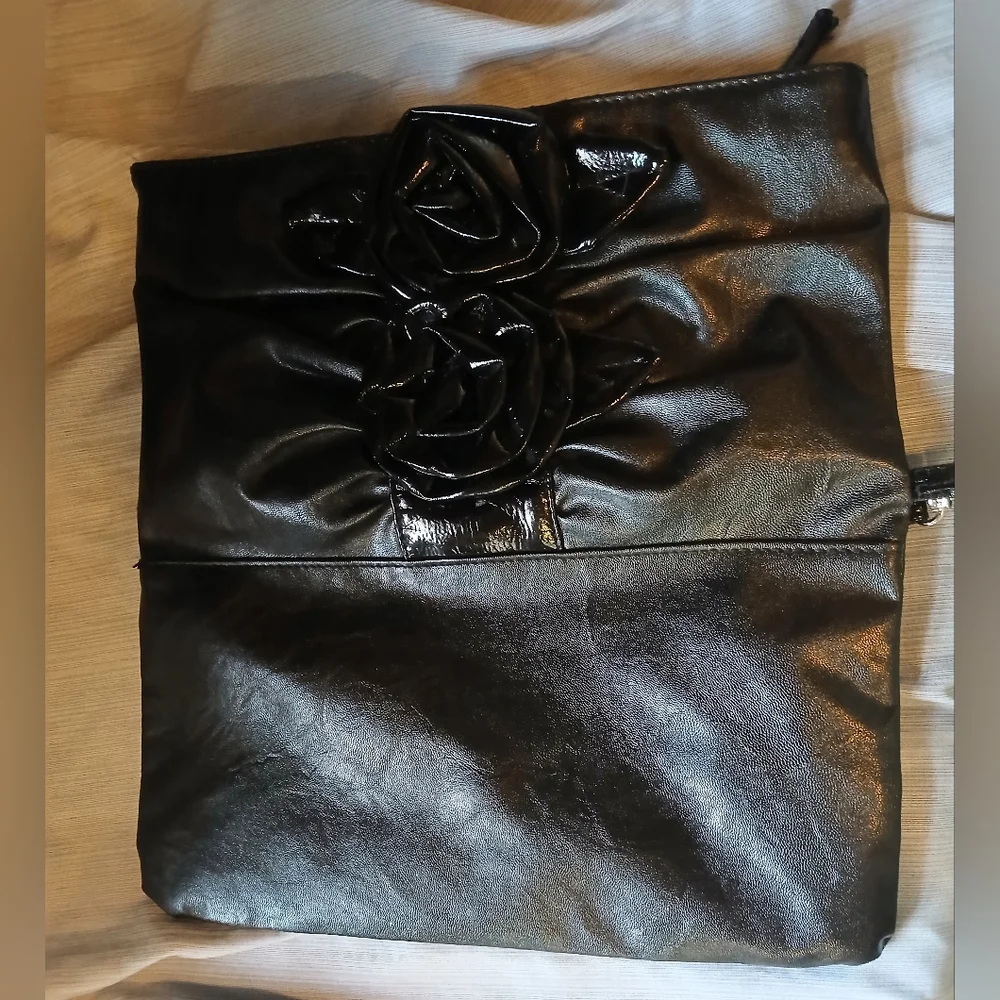 NOATD Elegant Black Clutch with Floral Design.